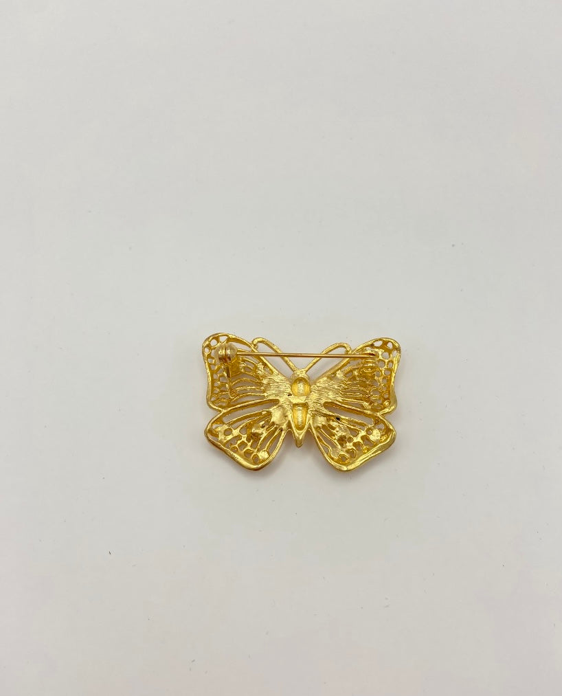 Pin de tono dorado de mariposa