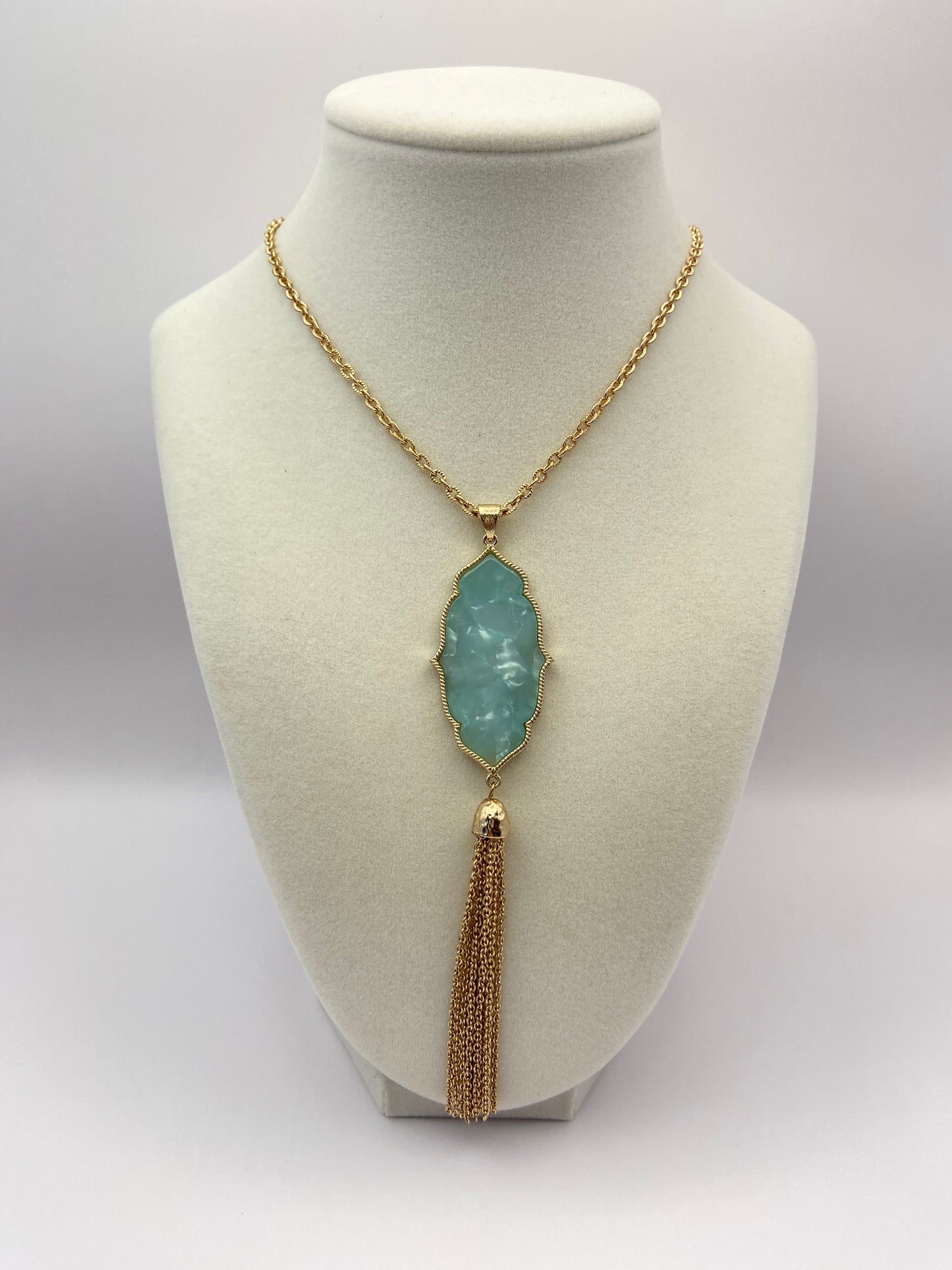 Gold Tone Necklace with Blue Pendant