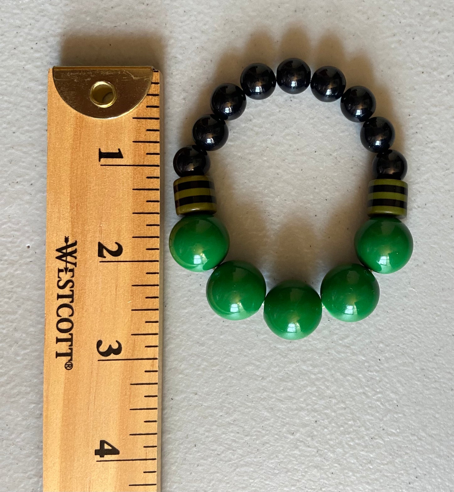 Elegant Bracelet with Black and Green Beads